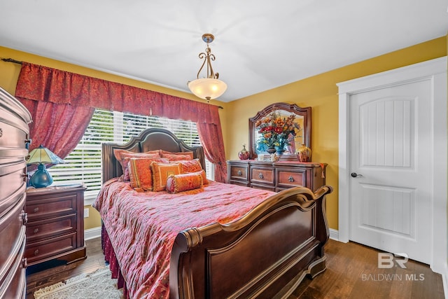 10128 Alder Ave, Spanish Fort, AL 36527 - bedroom featuring wood finished floors and baseboards
