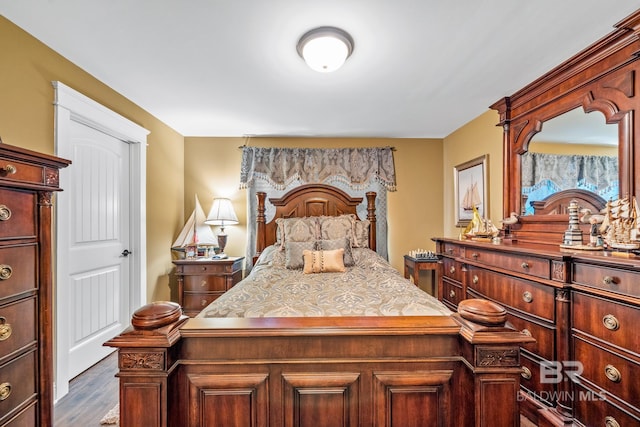 10128 Alder Ave, Spanish Fort, AL 36527 - bedroom with dark wood-style flooring