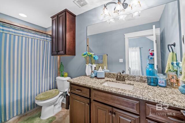10128 Alder Ave, Spanish Fort, AL 36527 - full bathroom with vanity, toilet, a chandelier, and curtained shower