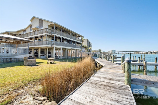 dock area featuring a water view