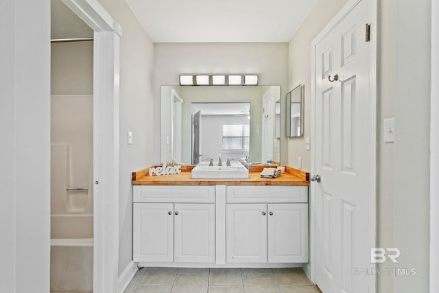 bathroom with vanity and tile patterned floors