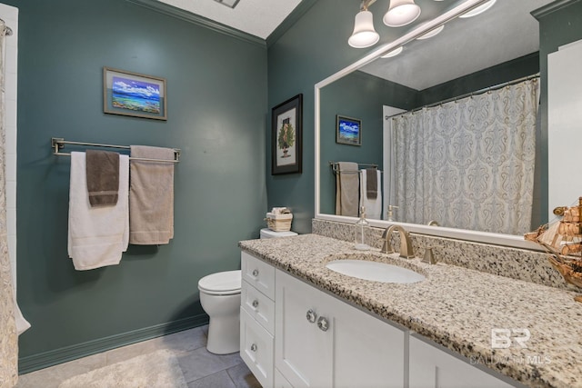 bathroom with vanity, ornamental molding, toilet, baseboards, and a shower with shower curtain