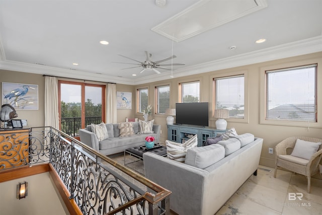 living area featuring recessed lighting, attic access, crown molding, and a ceiling fan
