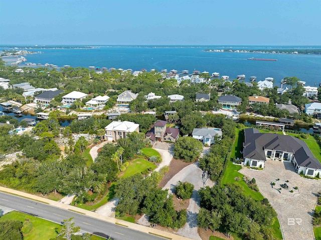 aerial view featuring a residential view and a water view