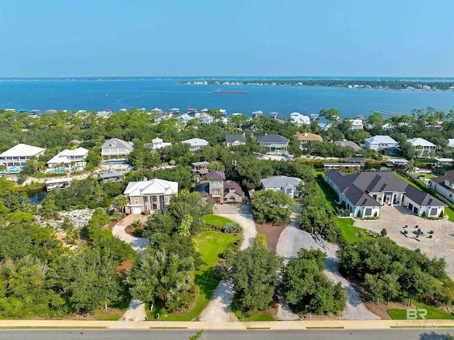 aerial view with a residential view and a water view
