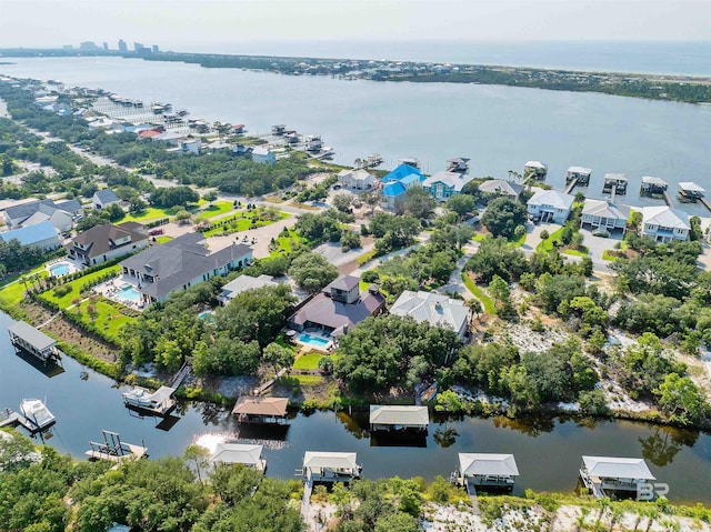 bird's eye view with a water view and a residential view
