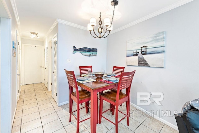 dining area with light tile patterned floors, a chandelier, ornamental molding, and baseboards