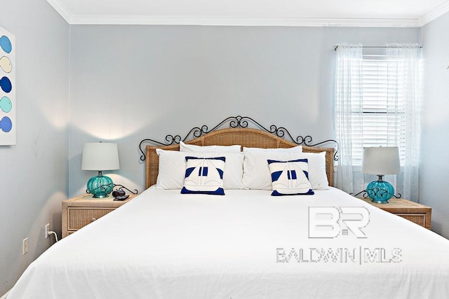 bedroom featuring ornamental molding
