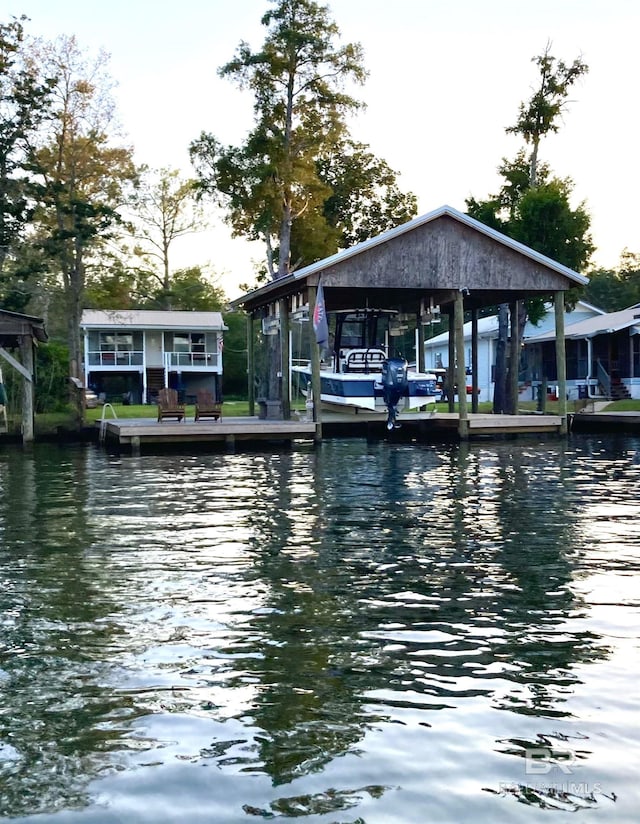 dock area featuring a water view