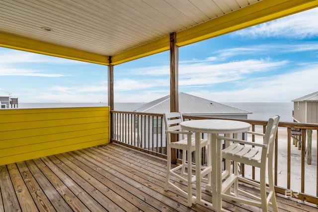 105 Strand Ct, Dauphin Island, AL 36528 - wooden deck with a water view