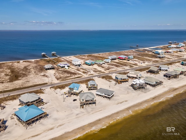 105 Strand Ct, Dauphin Island, AL 36528 - drone / aerial view featuring a beach view and a water view