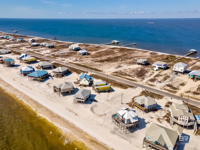 105 Strand Ct, Dauphin Island, AL 36528 - birds eye view of property with a water view and a view of the beach