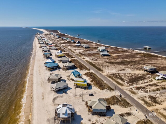 105 Strand Ct, Dauphin Island, AL 36528 - birds eye view of property with a view of the beach and a water view