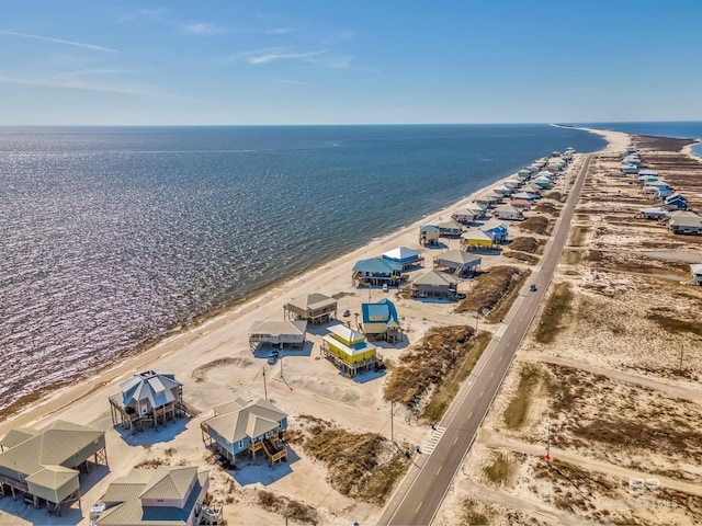 105 Strand Ct, Dauphin Island, AL 36528 - birds eye view of property featuring a water view and a beach view