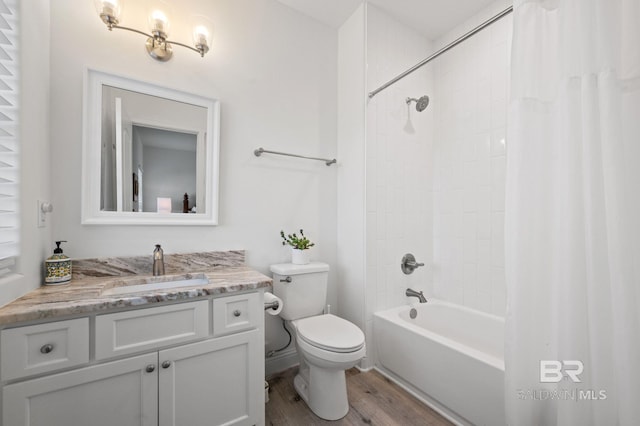 full bathroom featuring hardwood / wood-style flooring, vanity, toilet, and shower / bath combo with shower curtain