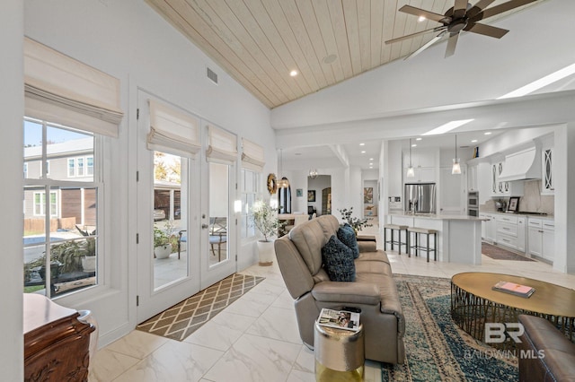 living room with french doors, high vaulted ceiling, ceiling fan, and wood ceiling