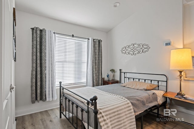 bedroom with light hardwood / wood-style flooring