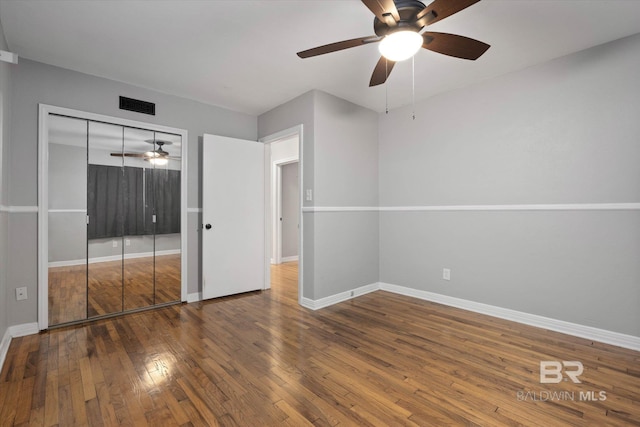 409 E Byron Ave, Mobile, AL 36609 - unfurnished bedroom with wood-type flooring, a closet, and ceiling fan