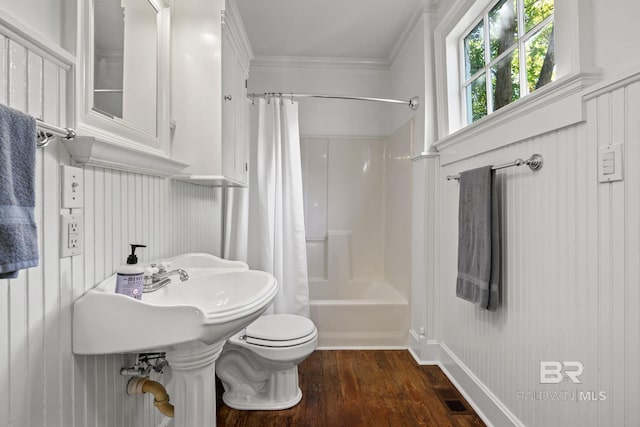 bathroom featuring toilet, crown molding, shower / bath combo, and wood-type flooring