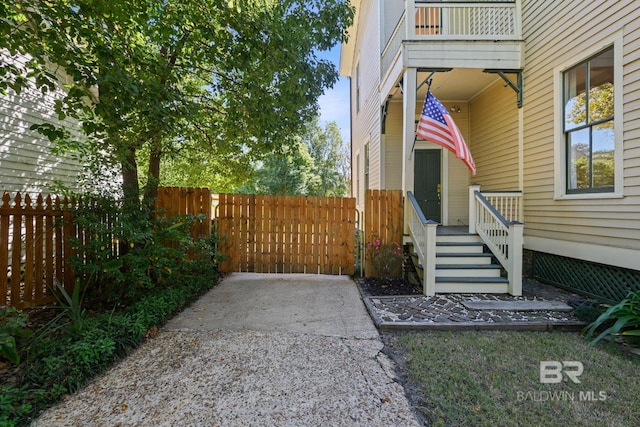 entrance to property with a patio