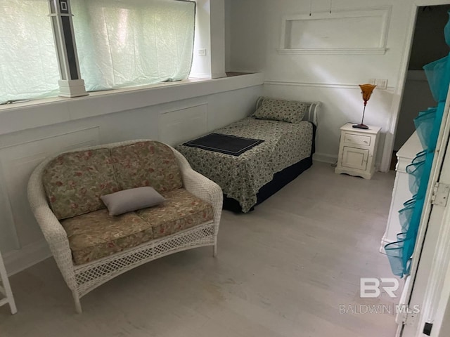 bedroom featuring light wood-style flooring