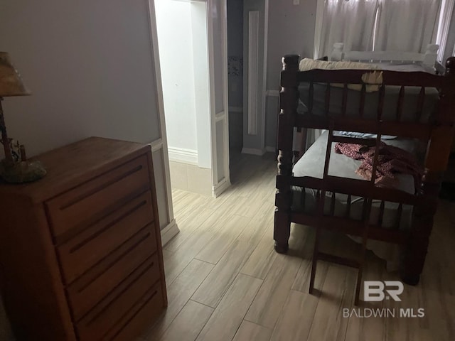 bedroom featuring light wood finished floors