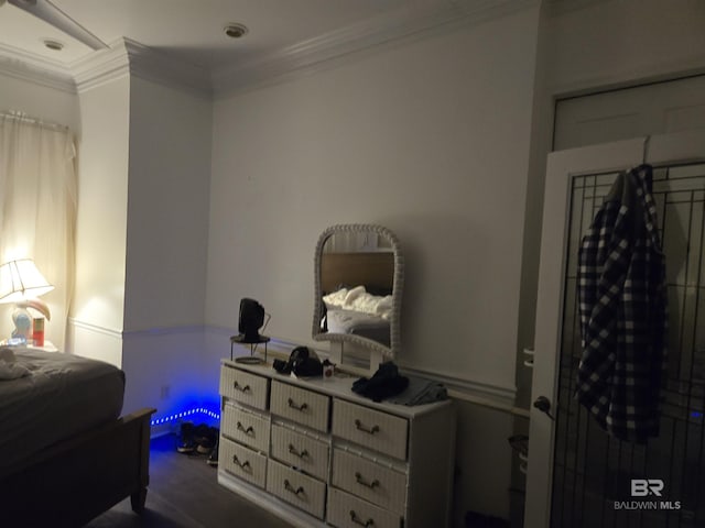 bedroom with ornamental molding