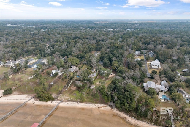 bird's eye view featuring a view of trees