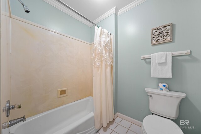 307 Audubon Pl, Dauphin Island, AL 36528 - bathroom with tile patterned flooring, shower / bath combo with shower curtain, toilet, baseboards, and ornamental molding