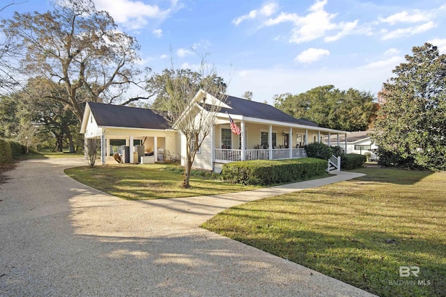 view of front facade with covered porch and a front lawn