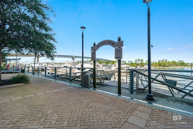 surrounding community featuring a water view