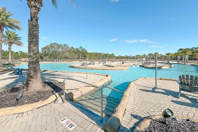 view of pool with a patio