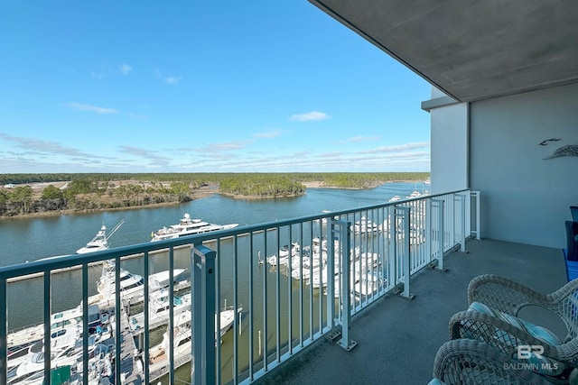 balcony featuring a water view