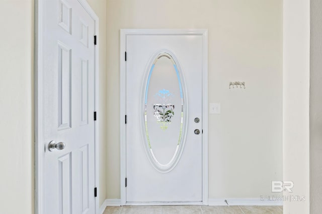 entrance foyer featuring light tile patterned flooring