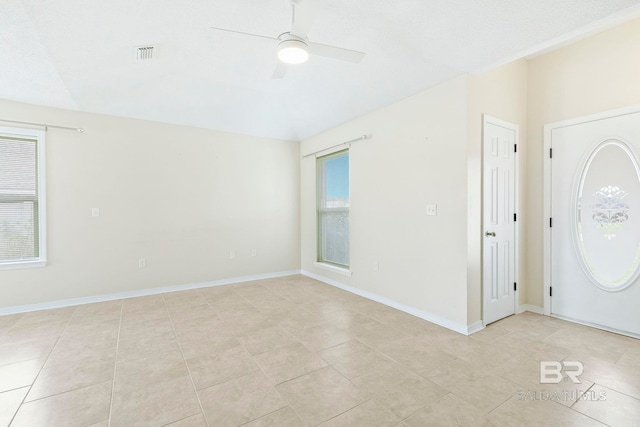 tiled foyer entrance featuring ceiling fan