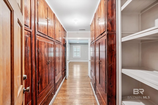 corridor featuring light hardwood / wood-style flooring