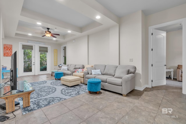 1430 Regency Rd Unit G101, Gulf Shores, AL 36542 - living area featuring a tray ceiling, ceiling fan, and recessed lighting