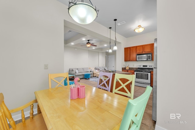 1430 Regency Rd Unit G101, Gulf Shores, AL 36542 - dining space featuring ceiling fan and baseboards