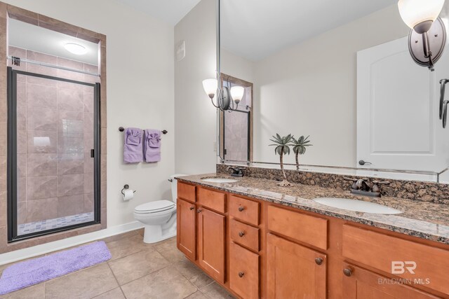1430 Regency Rd Unit G101, Gulf Shores, AL 36542 - bathroom featuring double vanity, a stall shower, and tile patterned floors