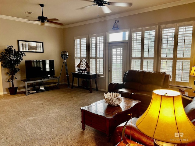 carpeted living room with ceiling fan and ornamental molding