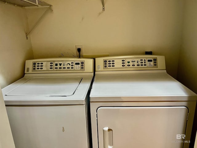 laundry area with washer and clothes dryer