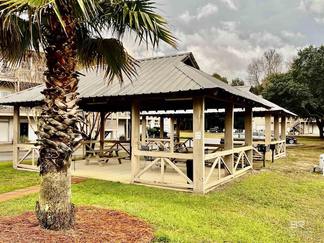 view of community featuring a gazebo and a lawn