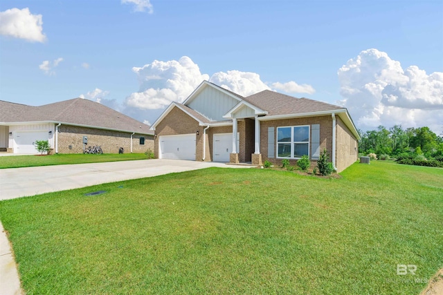 view of front of home featuring a garage and a front lawn