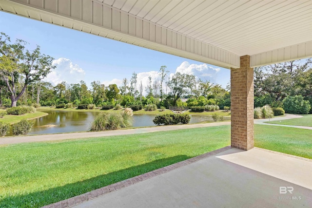 view of patio / terrace with a water view