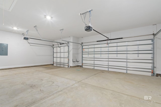 garage with electric panel and a garage door opener