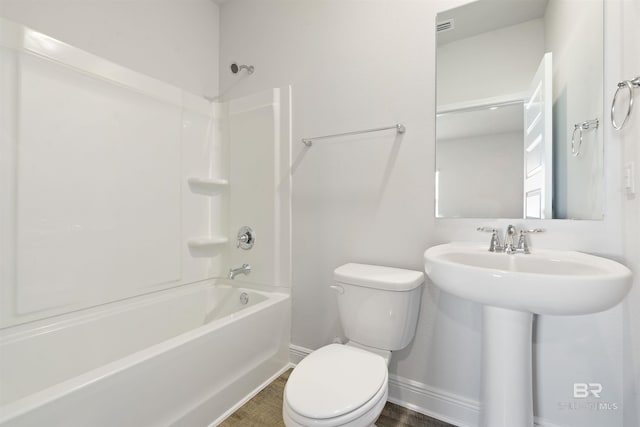 full bathroom with  shower combination, toilet, wood-type flooring, and sink