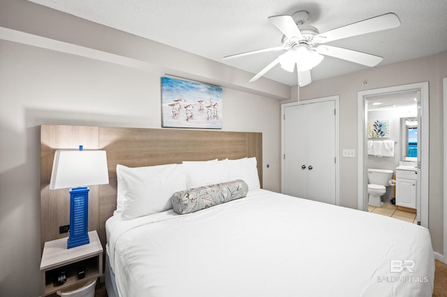 533 W Beach Blvd Unit 602, Gulf Shores, AL 36542 - bedroom with a ceiling fan and ensuite bathroom