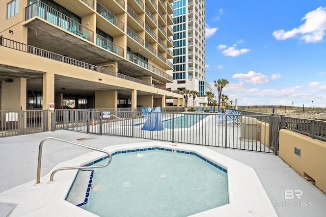 533 W Beach Blvd Unit 602, Gulf Shores, AL 36542 - pool with fence and a patio area