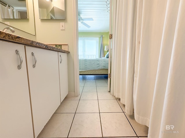 corridor featuring light tile patterned floors
