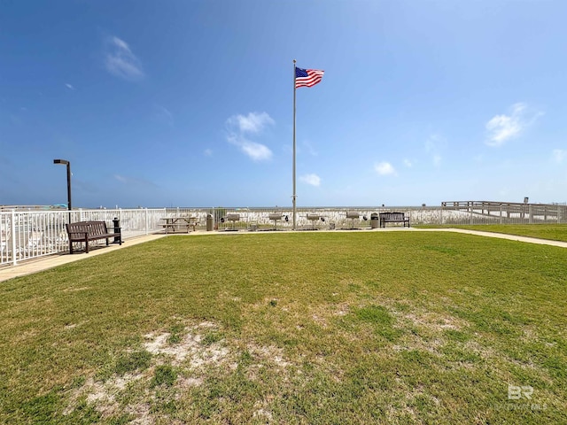 surrounding community with a yard